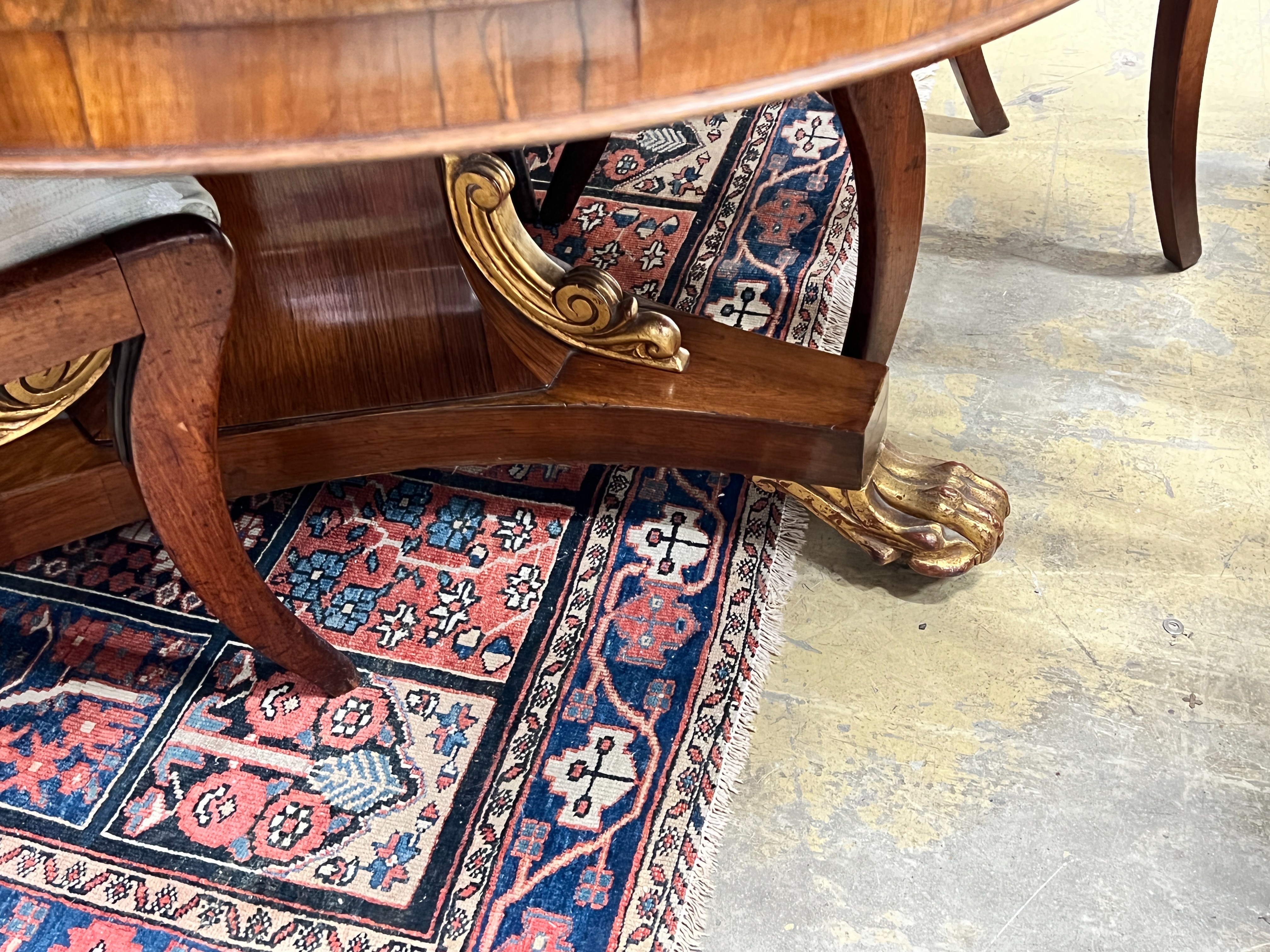 A Regency and later circular parcel gilt rosewood breakfast table (no bolts), diameter 122cm, height 73cm